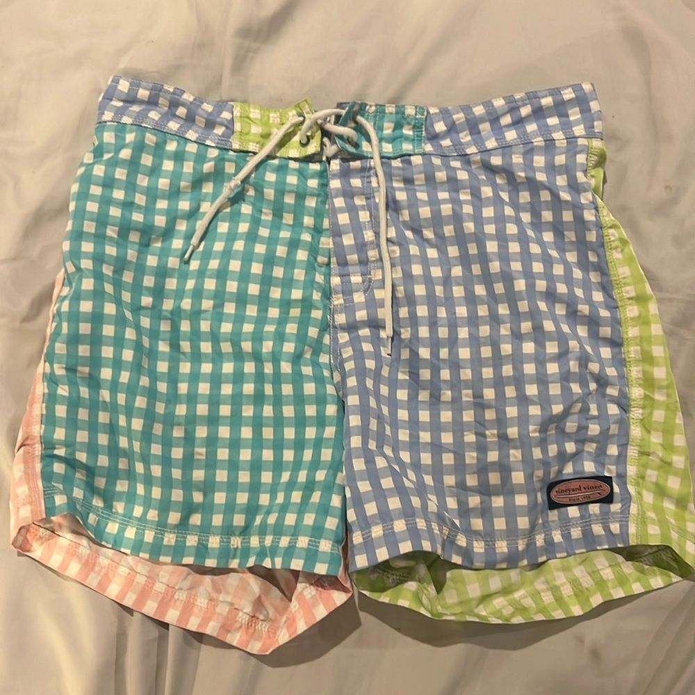 Size 33 vineyard vines swimming trunks. Used but in great condition.